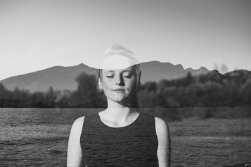 Portrait of girl with closed eyes in nature, double exposure.