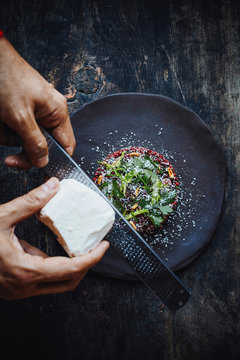 Chef decorating the plate