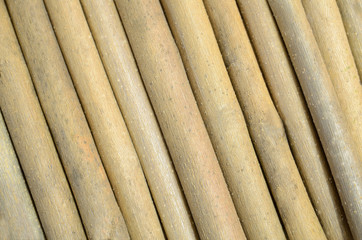 Background from obliquely laid maple thin sticks.