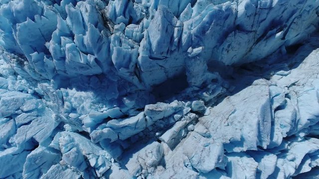 Arial 4k shots of a glacier and it's surroundings in Alaska