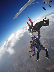 Tuinposter Skydiving team © Mauricio G