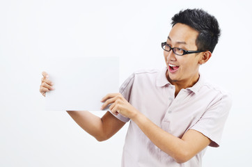 Asian man holding blank card board