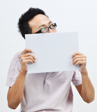 Asian Man Holding White Paper Card Covering Mouth