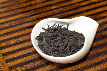 Chahe with black tea for Chinese tea drinking on the table. Traditional Chinese tea drinking ceremony.