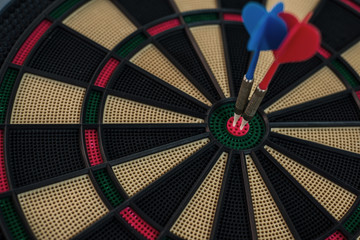 Two darts on a dart board