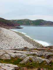 Panoramic view on the rocky shore of the Barents sea. Kola Peninsula, Arctic. Russia.