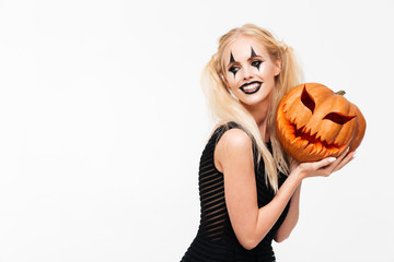 Portrait of a smiling blonde woman in halloween make up