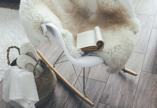 Rocket Chair With Sheep Skin Rug In Scandinavian Living Room