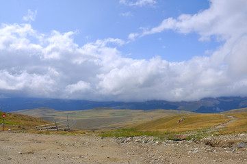 Distant view from the mountains with beautiful clouds