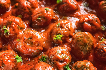 Delicious meatballs in tomato sauce, closeup