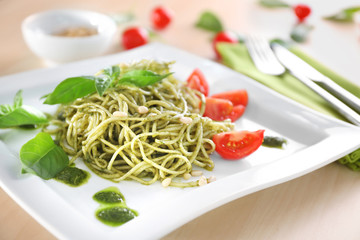 Delicious pasta with pesto sauce on plate