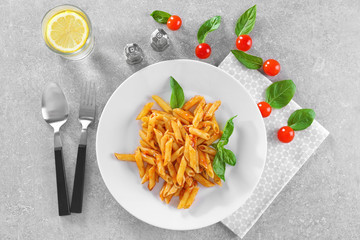 Delicious pasta with tomato sauce on plate