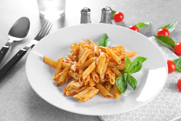 Delicious pasta with tomato sauce on plate