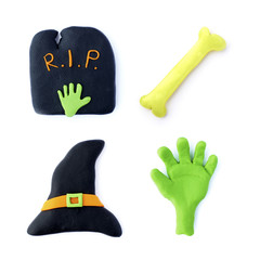 Set Halloween. Handmade. Plasticine. Zombie, black witch hat, tombstone, bone  isolated on a white background