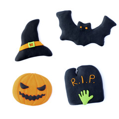 Set Halloween. Handmade. Plasticine. Pumpkin, zombie, bat, tombstone, black witch hat isolated on a white background