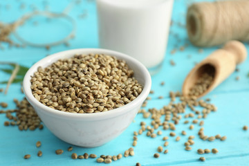 Bowl with hemp grains on kitchen table