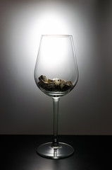 Wine glass filled with dice