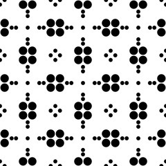 Abstract seamless pattern from grid of circles different sizes. Simple black and white geometric texture for fabric or clothing. Vector