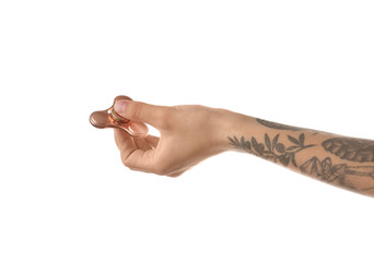 Woman holding modern spinner on white background