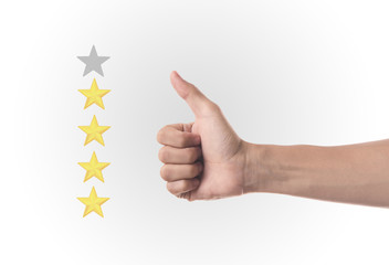 Business hand thumb up with yellow marker on five star rating. concept customer service excellent.