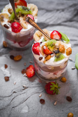 Nutrition Yoghurt fruit dessert strawberries banana kiwi raisins sunflower seeds oatmeal walnuts caramel