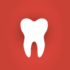 Sticker paper tooth on red background.