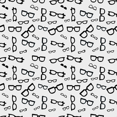 Cute kids pattern for girls and boys. Colorful glasses on the abstract grunge background create a fun cartoon drawing. The background is made in neon colors. Urban backdrop for textile and fabric.