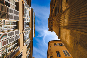 View from below of old houses facade in Aix en Provence France