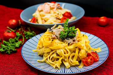 tasty pasta with salmon on a the table