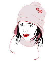 Portrait of cute girl in warm scarf and hat.