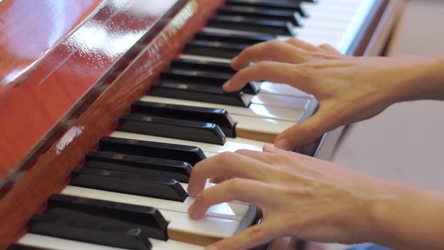 Hands Playing Piano