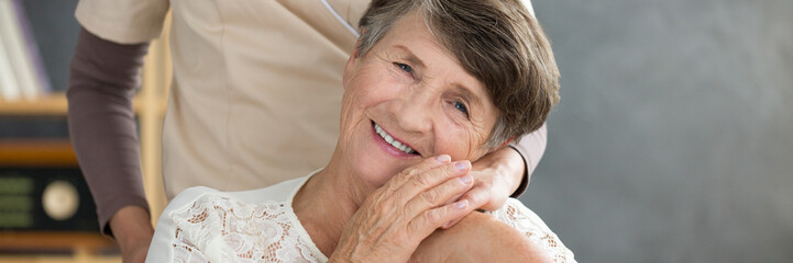 Grateful senior woman thanking daughter