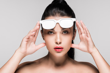 Fototapeta premium woman in white painted sunglasses