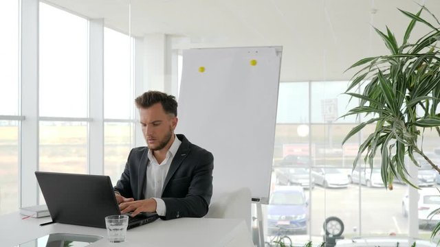 boss sign document at table, secretary holds in hand documentation at office, business people on background flipchart in white and spacious office, assistant keep on arms work report