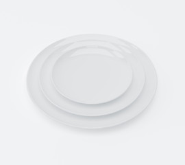 Plates of three different sizes on white background, 3D rendering