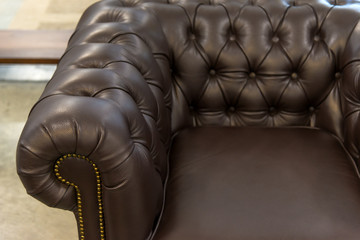 Obraz premium Vintage luxurious brown velvet sofa interior decoration