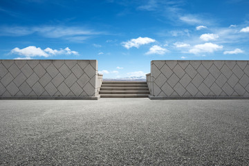 empty asphalt road with snow mountains