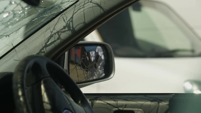 Aggressive astronaut with road rage vandalizing car mirror with baseball bat