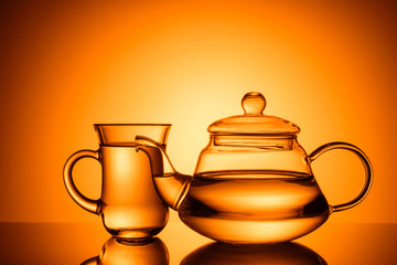 glass teapot and a cup of tea