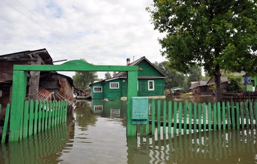 Flood. The river Ob, which emerged from the shores, flooded the outskirts of the city.