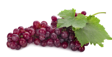 Ripe red grape. Pink bunch with leaves isolated on white. With clipping path. Full depth of field.