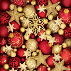 Christmas gold and red bauble decorations forming an abstract background.