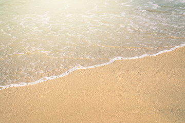 Fototapeta na wymiar Summer sand and beautiful wave in the beach..