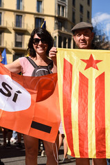 Plakat protesters in the manifestation of the (SI) in Barcelona, September 11, 2017