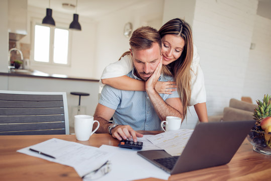 Young Family Discussing Family Finances