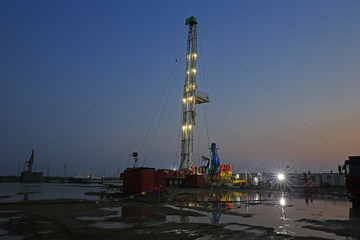 Oil drilling platform in the beautiful night