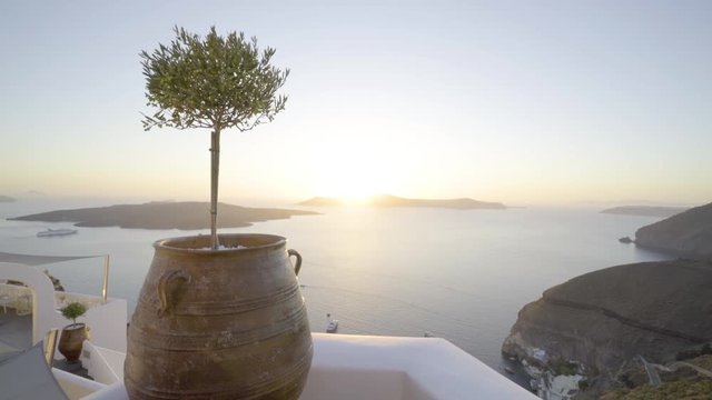 4k travel video amazing view from terrace high up on santorini island to caldera and sunset