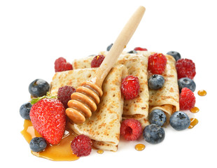 French crepes with berries and honey