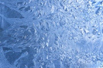 Ice pattern on window glass in winter time