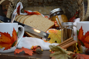 Autumn food set with tea, cup bread, and jelly